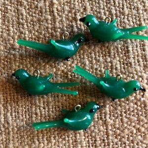 Green bird charms